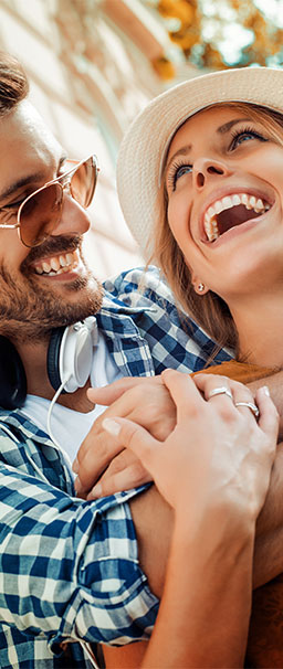 couple laughing together outside