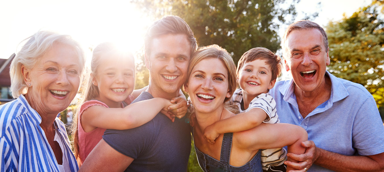 multi-generational family smiling